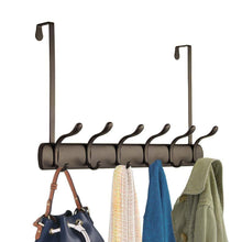 Load image into Gallery viewer, Amazon mdesign decorative over door long easy reach 12 hook metal storage organizer rack to hang jackets coats hoodies clothing hats scarves purses leashes bath towels robes 2 pack bronze
